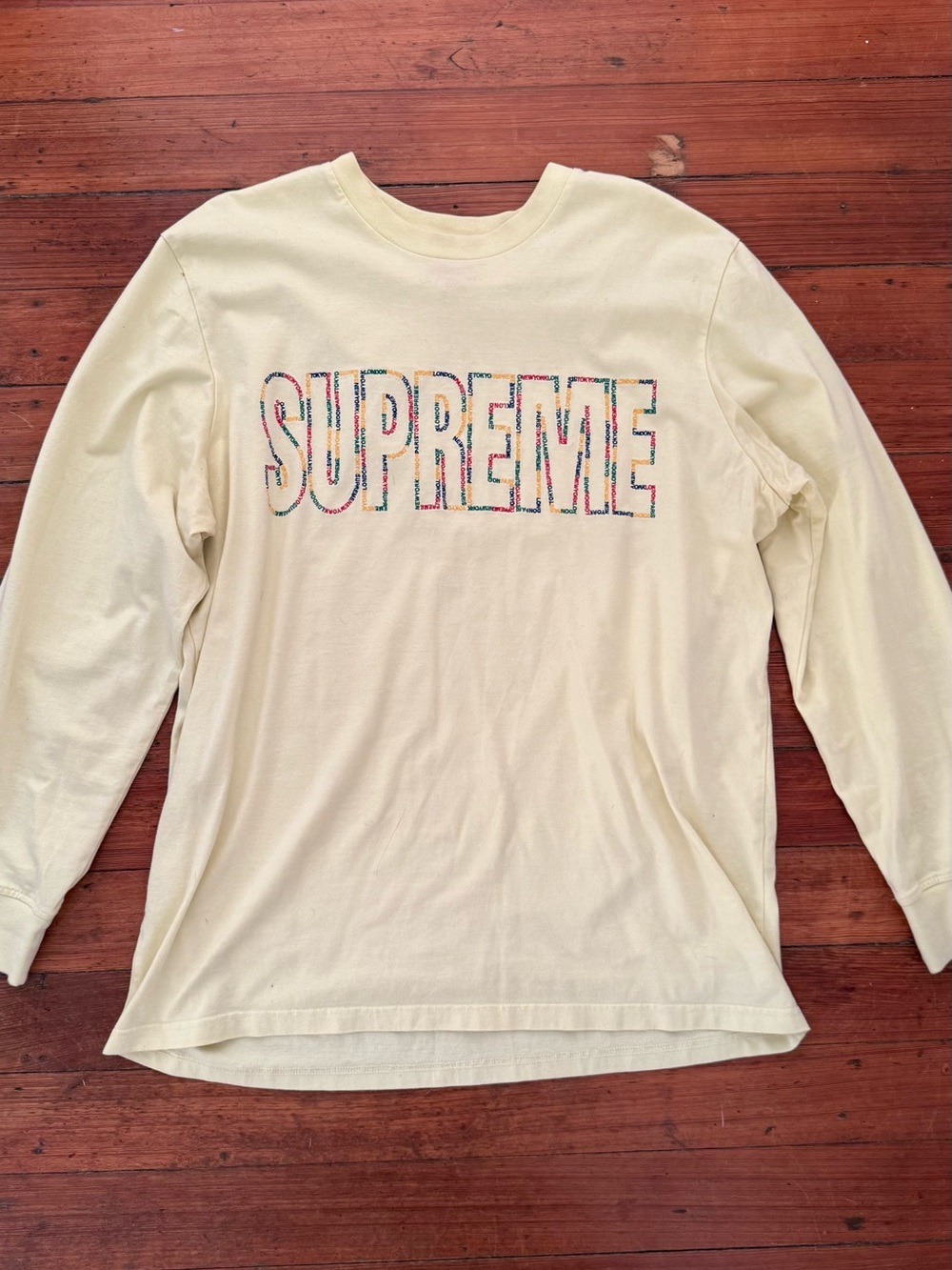 SUPREME INTERNATIONAL TEE